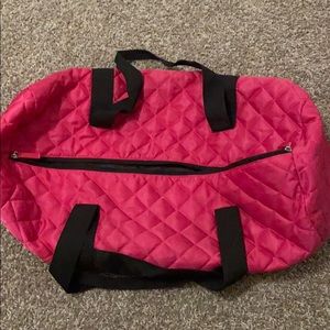 Pink duffle bag